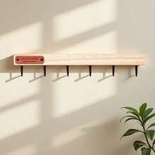 北欧风木质钥匙架，适用于玄关，简约自然木纹饰面，壁挂式设计，是收纳钥匙、太阳镜和小饰品的理想之选。这款钥匙架可轻松挂在墙上，方便整理日常必需品，其时尚永恒的设计使其成为家居装饰爱好者的完美礼物，兼具实用性和优雅气质。