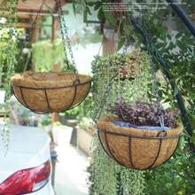 This Hanging Metal Wall Planter Comes With A Coconut Liner, Making It Rustic Yet Durable. It's Suitable For Both Indoor And Outdoor Use. Place It On The Balcony To Enjoy Sunlight And Greenery, Or Decorate The Patio To Create A Natural Garden Atmosphere. The Vintage Design Makes It A Focal Point For Home Decor.
