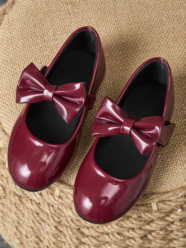 1 Paio di scarpe piatte eleganti e alla moda da principessa in pelle morbida con punta tonda, fiocco e motivo a quadri, adatte per la scuola o occasioni speciali