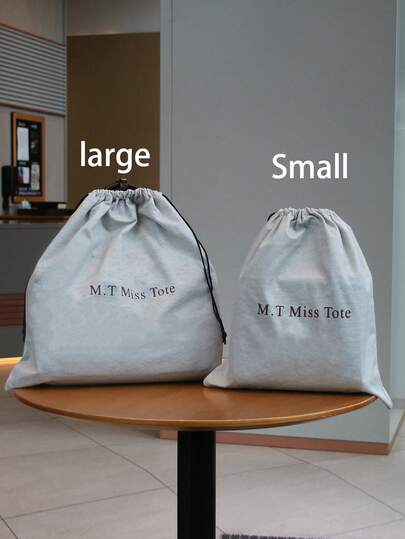 حقيبة تخزين غير منسوجة مطبوعة باللون الرمادي من القماش غير المنسوج ذات سعة كبيرة ومتعددة الأحجام لحماية الحقائب والأحذية الفاخرة من الغبار وذات إغلاق بسحاب