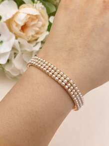 1 set/Múltiple Pulsera de tenis con banda elástica y perlas falsas, color dorado 3MM