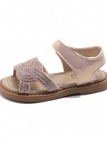This Popular Pink Children's Sandals Feature A Pink Upper With A Rhinestone-Embellished Woven Pattern, Pink Ankle Strap, And Brown Sole. The Elegant And Sweet Style Makes It A Fashionable Summer Item Suitable For Children's Daily Wear, Vacations, And Various Occasions. Fits Children Aged 3-12 Years Old. - Hồng - Xem 5