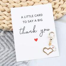 1 pièce Porte-clés unique breloque "Pocket Hug" avec Merci - Inclut un cœur, un bonnet d'infirmière, un design de stéthoscope, avec une carte de remerciement. Parfait comme cadeau de remerciement pour les médecins, les infirmières, les équipes médicales, le personnel EMS communautaire. Idéal pour la Journée des infirmières, cadeau de rétablissement, accessoire de voiture, pendentif de sac