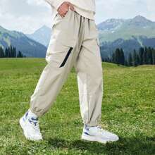 XTEP Xtep Cargo Pants For Men, Spring 2025 New Arrival Outdoor Large Pocket Casual Men's Commuter Versatile Tapered Athletic Pants. 876329560067