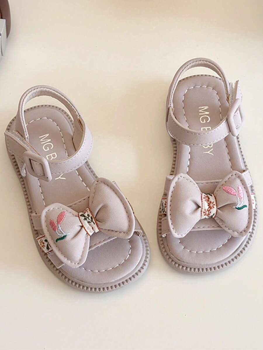 1 par de sandalias de niña talla grande vendidas en verano, suaves y dulces en tono gris claro. La correa está decorada con un elegante lazo y un hermoso bordado, lindas y de moda. Fabricadas con material resistente al desgaste, cómodas y suaves. Correa cruzada con diseño de gancho y bucle, fácil de poner y quitar, adecuadas para niñas de 3 a 12 años para usar en interiores y exteriores. La banda elástica tejida agrega un toque de moda, apta para niños de 3 a 12 años. - Rosa - Ver 1