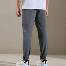 XTEP Athletic Pants For Men, Spring/Fall 2025 Official Quick-Dry Breathable Woven Athletic Pants, Casual Training Gym Pants. 876229980205