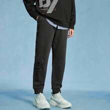 XTEP Xtep Sports Pants Men's Spring Official Loose Printed Men's Pants Casual Ankle Pants 976129630316