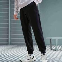 XTEP Pantalones deportivos Nuevos pantalones de entrenamiento integral de punto para hombres, primavera, aptitud 876329630163