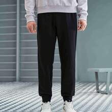 XTEP Pantalones deportivos Nuevos pantalones de entrenamiento integral de punto para hombres, primavera, aptitud 876329630163