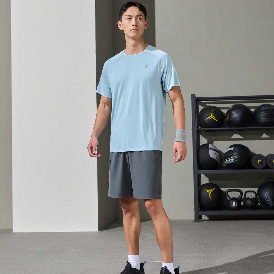 XTEP Pantalones cortos deportivos para hombres, pantalones cortos de verano sueltos y ligeros de 5 pulgadas, de secado rápido, para correr y gimnasio. 876229670158