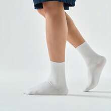 XTEP Calcetines deportivos para hombres, genuinos, cómodos y transpirables, de color liso, en paquete de tres pares. Referencia 878139560045