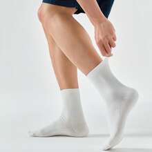 XTEP Calcetines deportivos para hombres, genuinos, cómodos y transpirables, de color liso, en paquete de tres pares. Referencia 878139560045