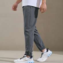 XTEP Athletic Pants For Men, Spring/Fall 2025 Official Quick-Dry Breathable Woven Athletic Pants, Casual Training Gym Pants. 876229980205