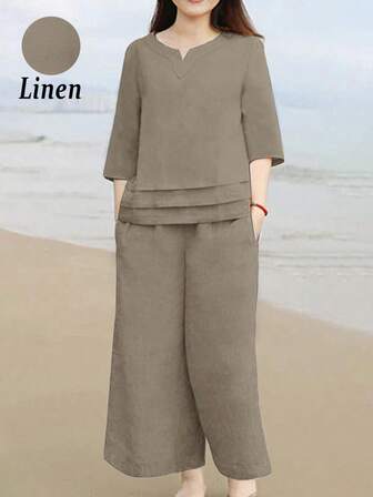 2 件套女士纯色 V 领上衣和口袋裤休闲装