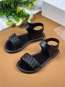 1 par de sandalias abiertas de niña pequeña con correa de PU de color negro sólido, estilo trenzado con , puntera redonda, cómodas y de moda tipo romanas, apropiadas para niñas de 3 a 12 años, para uso diario, casual, vacaciones, primavera/verano 2025