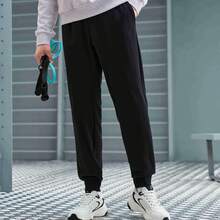 XTEP Pantalones deportivos Nuevos pantalones de entrenamiento integral de punto para hombres, primavera, aptitud 876329630163