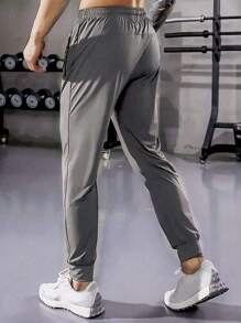 1 pieza Pantalón deportivo de secado rápido para hombre, pantalón de chándal casual con cintura con cordón sólido para gimnasio y fitness