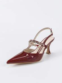 女士优雅尖头高跟鞋，采用亮面珠光材质，步步闪耀，纯色简约设计，百搭各种礼服，适合婚礼和派对场合