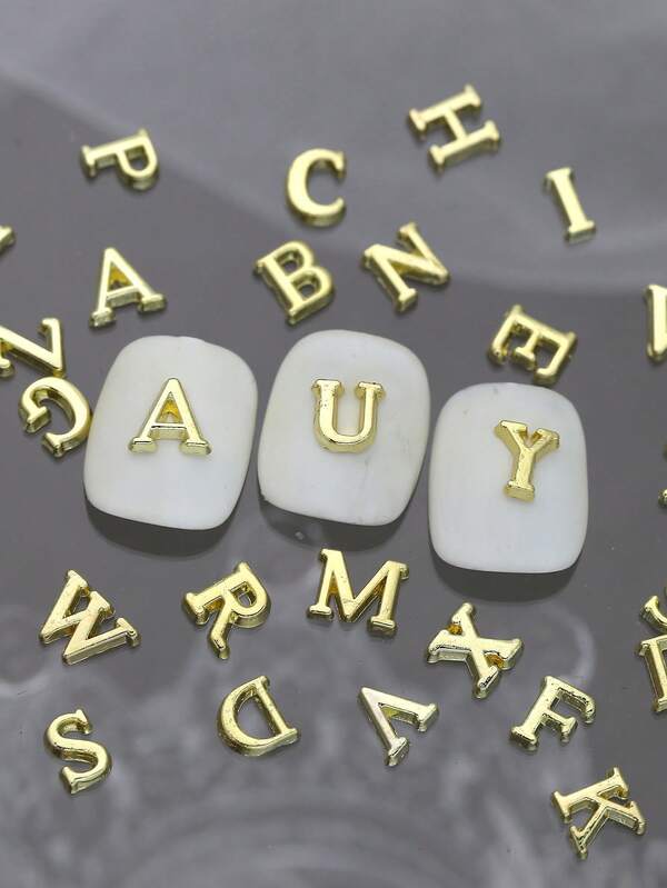 100 pezzi/borsa Accessori per unghie in metallo dorato e argentato, con lettere e strass in lega, per decorazioni unghie fai-da-te, forniture per unghie, gemme per unghie