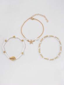3 pièces/set Bracelet vintage multicouche en perles de riz, pendentif avec éléments marins étoile de mer et coquillage, bijoux bohèmes de plage et de vacances pour femmes, accessoire sexy pour bikini et soirée (quantité et séquence de perles aléatoires)