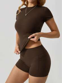 2pcs Women Spring/Summer Fashion Round Neck Short Sleeve T-Shirt And Side Pocket Sports Shorts Set
