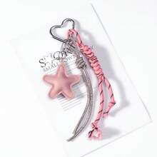 Llavero con colgante de estrella hecho a mano de cuerda trenzada y - Accesorio para bolsos, llaves y decoración de mochilas - Rosa - Ver 4