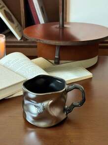This Dark Butterfly Style Cup Has A Unique Design. With A Dark Tone, The Cup Body Features A Butterfly Relief, Embodying The Aesthetic Of Dark Beauty. The Material May Be Ceramic, Processed To Have A Metallic Luster. The Asymmetrical Cup Body Is Paired With A Curved Handle, Balancing Artistic Appeal And Comfortable Grip. Can Be Used As A Daily Drinkware Or Home Decor. Back To School