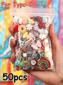 10/15/20/25/30/40/50 pezzi Tappi anti-polvere misti casuali (stile non ripetitivo), accessori per smartphone in lega/resina, ciondoli, piccole decorazioni, charm, cartoni animati, strass, nappe, 3D stereoscopici, gocce piatte di olio ecc. Vari colori, stili, motivi, forme, edizioni da collezione