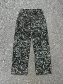 Yemwry Pantalones largos casuales con cordón y estampado de camuflaje para hombre, que combina elementos naturales, con diseño ajustable de cordón, adecuado para el transporte diario o actividades al aire libre, mostrando un estilo único