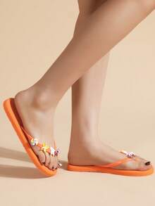 伊娃女士平底人字拖，时尚、轻便、舒适，适合夏季户外休闲穿着，是夏季、海滩、旅行和其他场合的理想之选。 - 亮橙色 - 查看 6