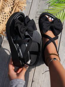 Women's Black Platform Sandals With Large Bow Decor, Comfortable Criss-Cross Ankle Strap, Easy Slip-On Design, Suitable For Beach, Vacation & Casual Outings