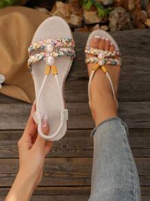 Sandales compensées d'été neuves pour femmes, avec fond épais. Décor de strass, style bohème tressé à bout rond ouvert. Confortable, légère, talon compensé, semelle corde. Parfait pour la plage et les vacances. Idéal comme cadeau.