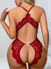 Body sexy de mujer con cuello en V profundo transparente, tejido jacquard, espalda descubierta, decoración de lazo en el pecho, encaje floral cruzado en la entrepierna, decoración de hebilla metálica con forma de corazón, recorte ondulado, tirantes ajustables