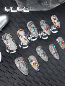 Bộ 10 móng tay giả hình hạnh nhân màu bạc mờ, nền hồng nude, trang trí 3D đính đá nhiều màu sắc, kiểu punk, độ phủ toàn bộ, độ dài trung bình, dụng cụ làm móng cho nữ và bé gái, kèm 1 dũa móng mini và 1 tờ keo dán, đồ dùng làm móng cho bé gái sử dụng hàng ngày và dự tiệc. - trắng - Xem 4