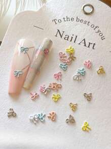 10 pezzi Mini decorazioni per unghie in lega a forma di fiocco, delicati fiocchi kawaii dipinti cavi, adatti per la realizzazione di gioielli, decorazioni per unghie, accessori per capelli, custodie per telefoni - senza profumo, ideali per fai-da-te e hobby creativi