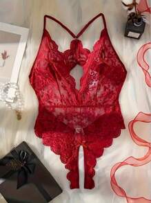 Body sexy de mujer con cuello en V profundo transparente, tejido jacquard, espalda descubierta, decoración de lazo en el pecho, encaje floral cruzado en la entrepierna, decoración de hebilla metálica con forma de corazón, recorte ondulado, tirantes ajustables