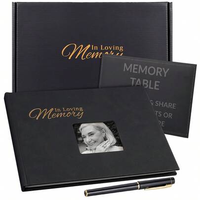 OUR ADVENTURE BOOK A Funeral Message Book With A Black Leather Cover, Commemorating The Funeral Message Book On Page 88, Featuring A Memory Desk Logo And Pocket For A Celebration Of Life Message Book