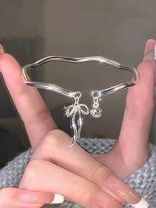 1pc Sweet Bowknot Bell Wavy Open Bangle Bracelet, Adjustable - Silver - View 1