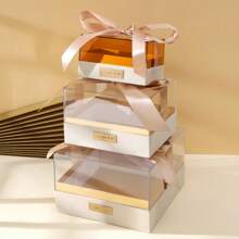 Customized Transparent Gift Box With Elegant Ribbon, Ideal Gift Choice. Customized Ribbon With Name, Wishes Or Special Dates To Make The Gift More Personalized. Suitable For Birthday, Anniversary And Other Occasions. Available In Multiple Box And Ribbon Colors.
