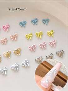 10 pezzi Mini decorazioni per unghie in lega a forma di fiocco, delicati fiocchi kawaii dipinti cavi, adatti per la realizzazione di gioielli, decorazioni per unghie, accessori per capelli, custodie per telefoni - senza profumo, ideali per fai-da-te e hobby creativi