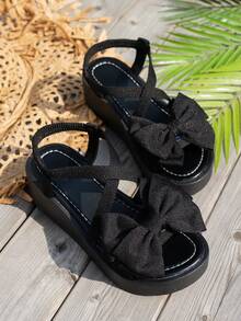 Women's Black Thick Sole Wedge Sandals With Oversized Bow Decor, Comfortable Cross Ankle Strap, Casual Beach Vacation Sandals, Fashionable Platform Shoes