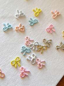 10 pezzi Mini decorazioni per unghie in lega a forma di fiocco, delicati fiocchi kawaii dipinti cavi, adatti per la realizzazione di gioielli, decorazioni per unghie, accessori per capelli, custodie per telefoni - senza profumo, ideali per fai-da-te e hobby creativi