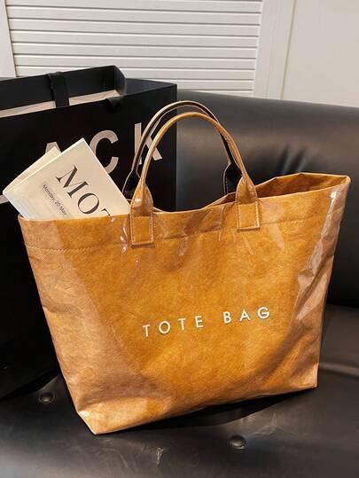 大容量时尚透明果冻袋PVC防水购物袋，韩版中性风手提包，INS时尚复古休闲街头手提包，日系慵懒风包，适合高中生、大学生上学、健身/瑜伽/旅行或作为妈妈包使用，字母印花极简明星风褶皱质感高端多层纸质手提包