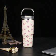 1个900毫升/33.44盎司心形蝴蝶结真空保温水瓶，大容量，带提手和吸管，双饮盖，适合旅行、户外、健身、学习、节日礼物 - 大米色蝴蝶結 - 查看 4