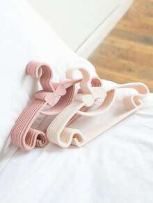 10个粉色儿童衣架便携式展示衣架塑料衣架婴儿衣服收纳架春季简约夏季上衣蝴蝶结挂夹塑料婴儿衣架防滑新生儿衣柜衣服收纳架适用于婴儿/幼儿衣服超薄 - 彩色 - 查看 2