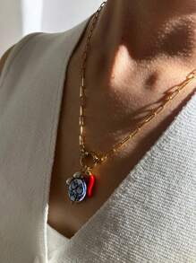 Monlansher Nuova collana con ciondolo in acciaio inossidabile per donna, design alla moda con timone e fibbia rotonda, con ciondoli in ceramica smaltata a forma di peperoncino e finta perla, collana versatile