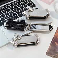 1 Stück tragbarer, faltbarer Haarbürste mit integriertem Spiegel - kompakte Reise-Massagebürste zum Stylen und Pflegen, Nylonborsten, ABS-Kunststoffgriff, ideal für Gym, Geldbörse, Schwimmen und Reisen