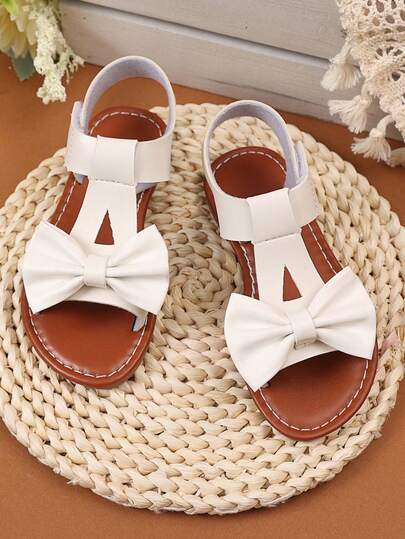1 Çift Büyük Beden Küçük Kız Çocuk Fildişi Rengi Düz Sandalet, Büyük Fiyonk Dekorlu Düz Renk PU Kayış, Cırt Cırtlı Kapatma, Yuvarlak Burun Açık Burun, Lüks Moda Roma Sandaletler 3-15 Yaş Arası Kız Çocukları İçin Günlük, Günlük, Parti, Seyahat, Tatil Giyim, İlkbahar/Yaz 2025