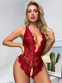 Body sexy de mujer con cuello en V profundo transparente, tejido jacquard, espalda descubierta, decoración de lazo en el pecho, encaje floral cruzado en la entrepierna, decoración de hebilla metálica con forma de corazón, recorte ondulado, tirantes ajustables