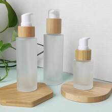 1pc Frosted Glass Pump Bottle With Bamboo Cap, 30ml/60ml/100ml Capacity, Portable Travel Cosmetic Container, Refillable Round Glass Bottle For Lotion, Shampoo And Body Wash, Essential For Back To School - Multicolor - View 1
